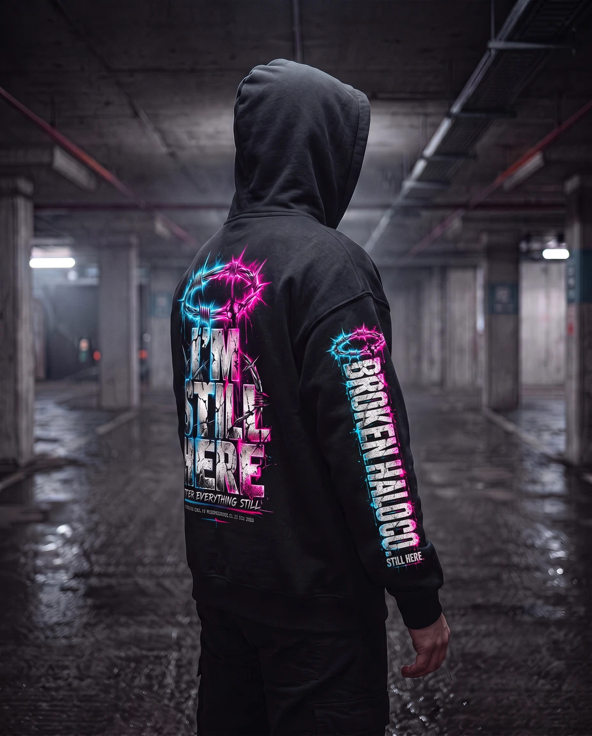 Angled back view showing the BROKEN HALO CO. artwork down the hoodie's right sleeve